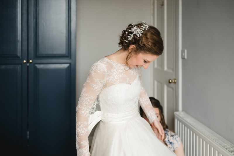 Silk wedding dress with chantilly lace jacket