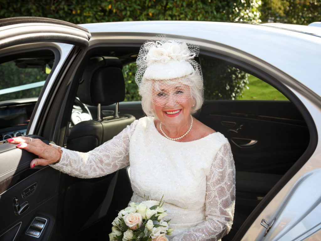 gorgeous bride in silk and sequins with birdcage veil
