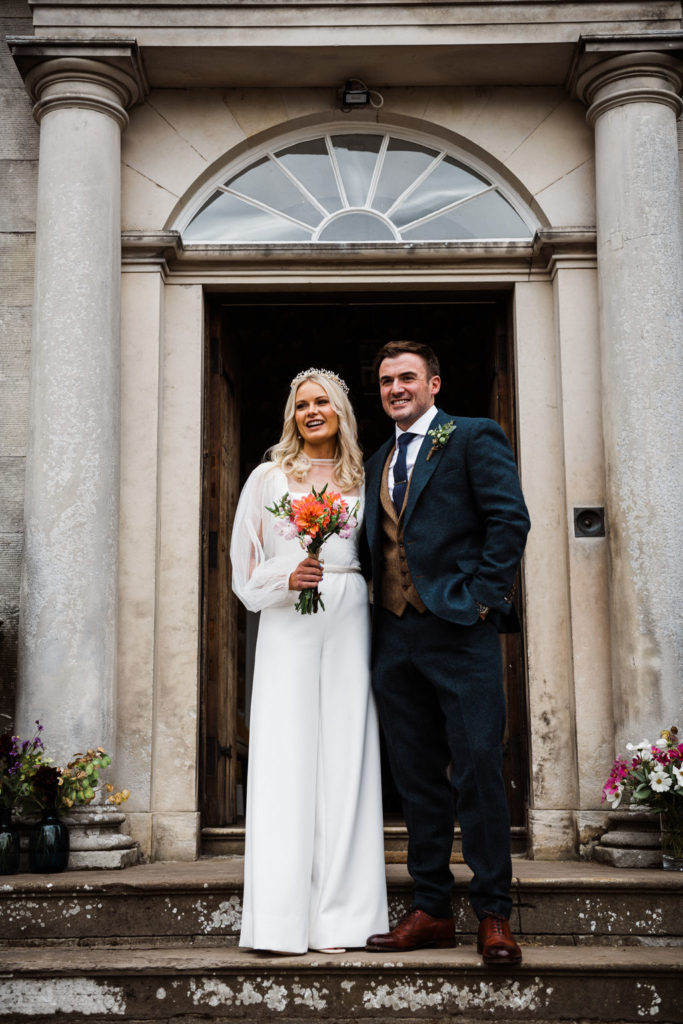 bride and groom for jumpsuit wedding