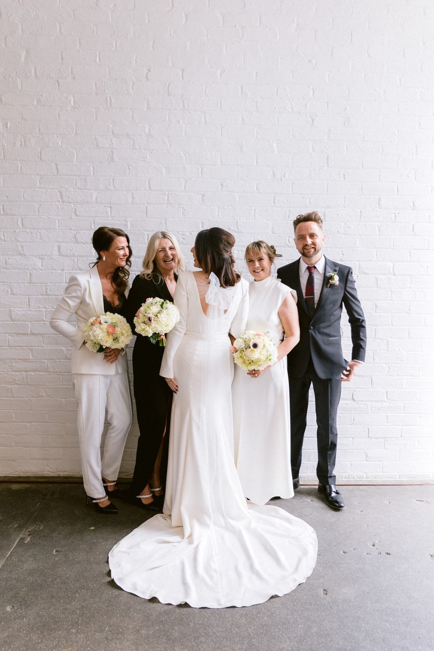 bridal party and bespoke wedding dress