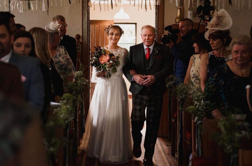 bride coming down the aisle