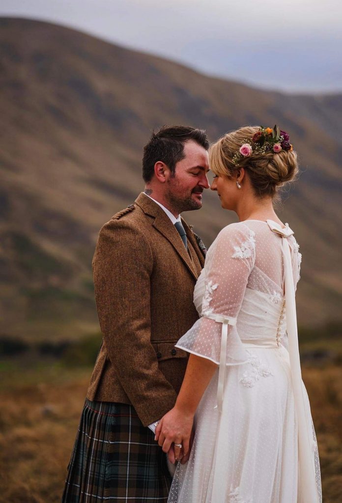 bride and groom in the scottish highlands