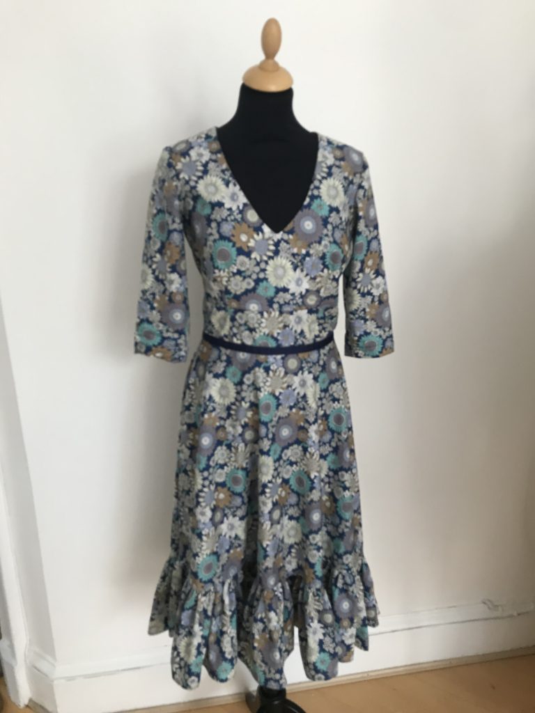 dress with deep v-neckline and floral print