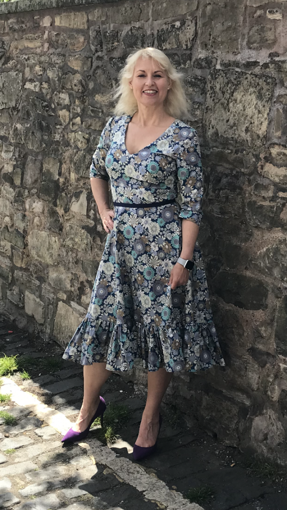 floral dress with frill in blue tones