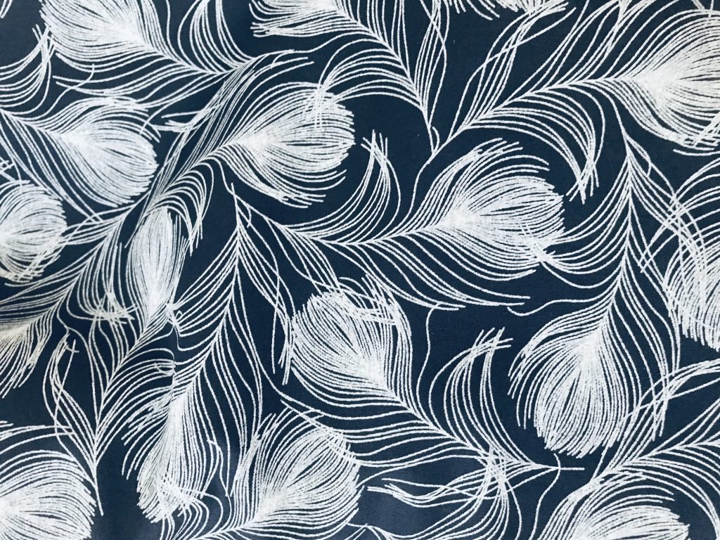 navy feather print poplin