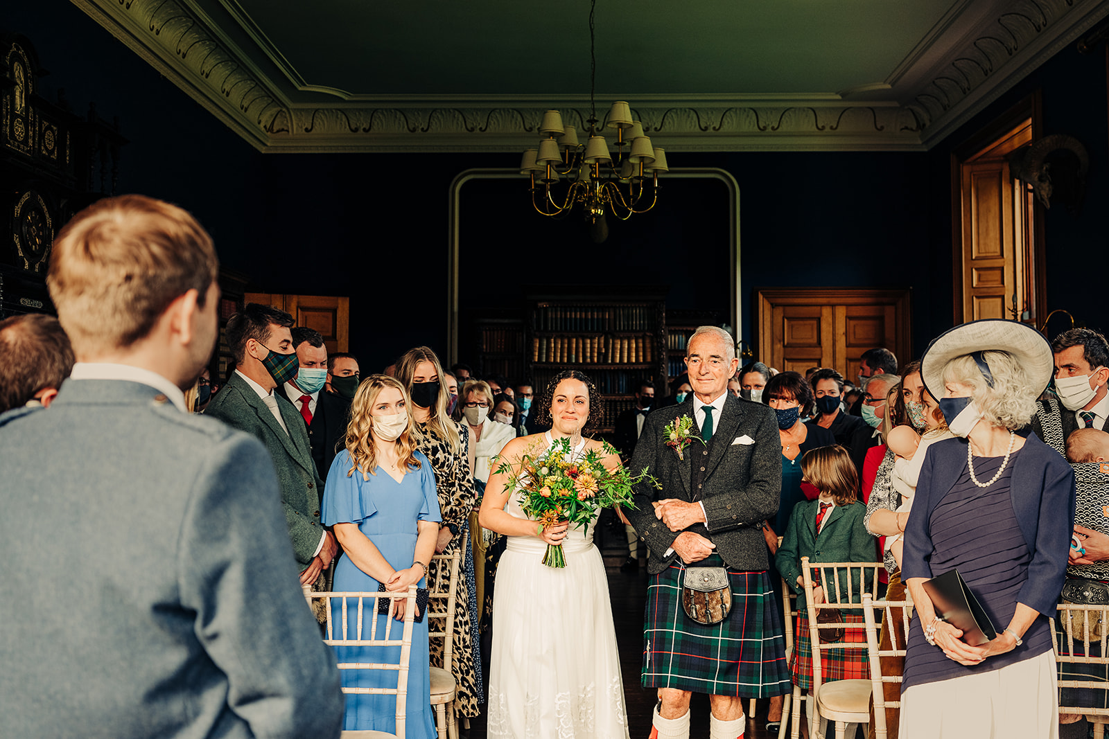 bride and father of the bride on the aisle