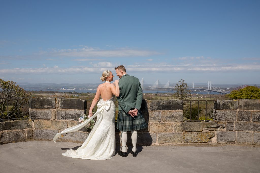 bride in beaded halter neck dress