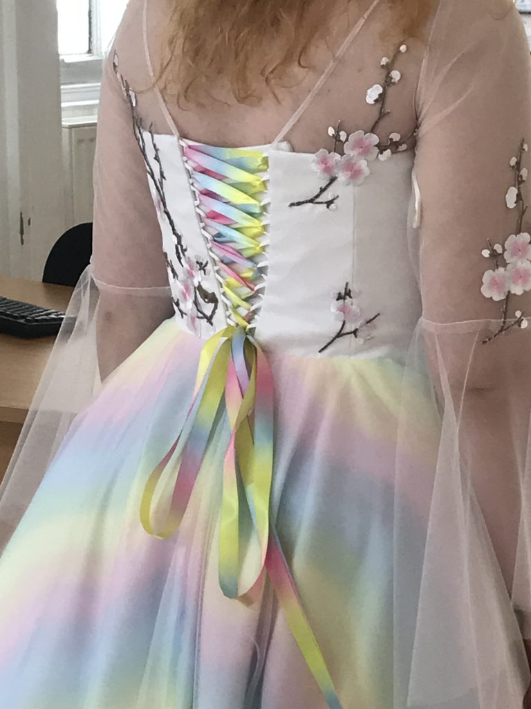 rainbow lace up on wedding dress