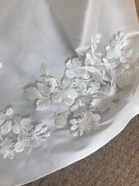 hidden lace bee on wedding dress