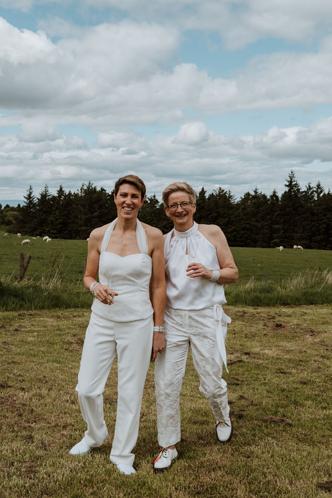 Two bridal trouser suits