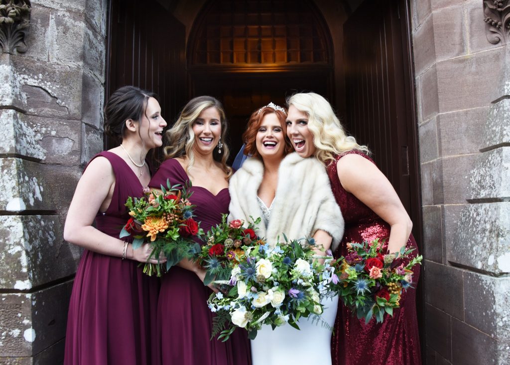 Bride and bridesmaids castle winter wedding