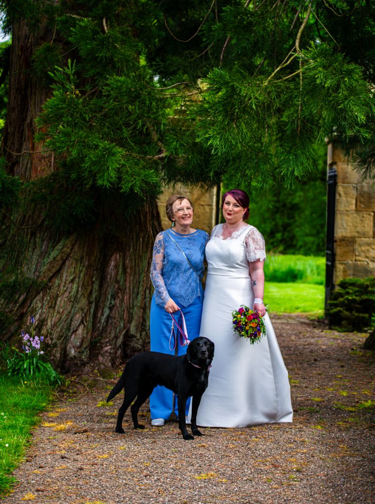 Bride and mother of the bride in bespoke dresses