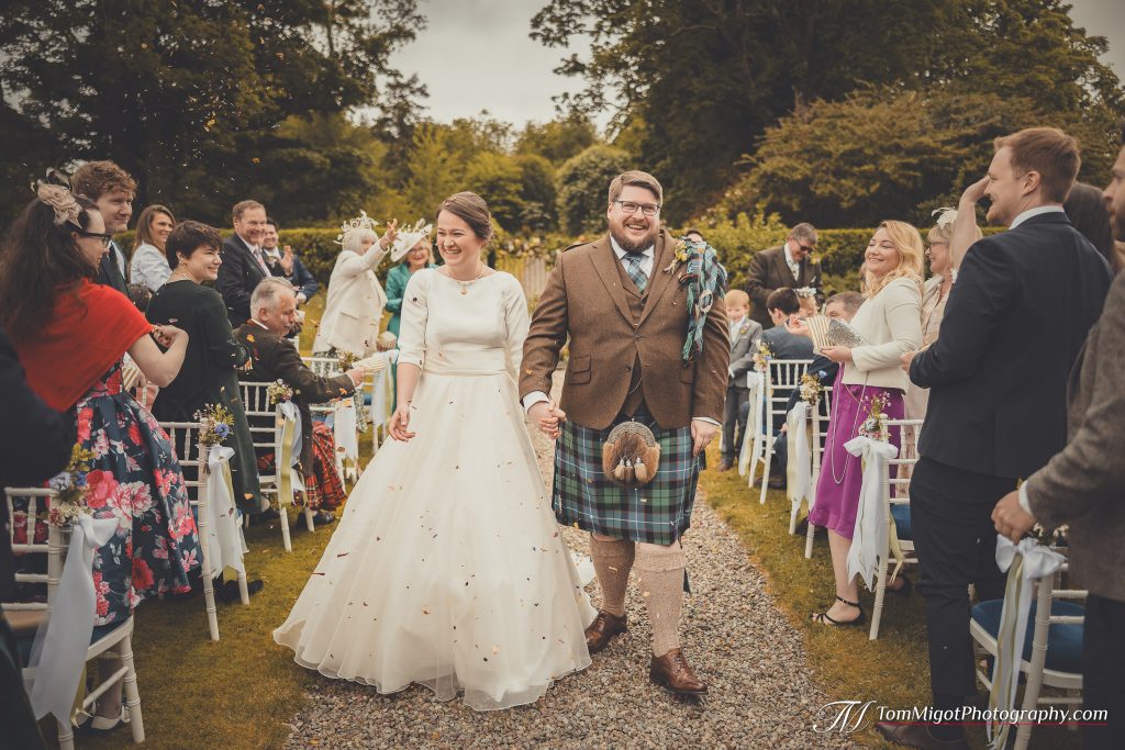 confetti shot of silk organza wedding dress with silk satin cowlneck