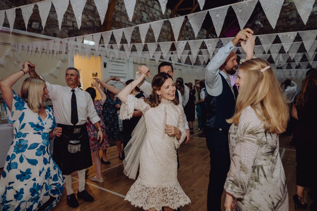 short guipure lace dress at reception