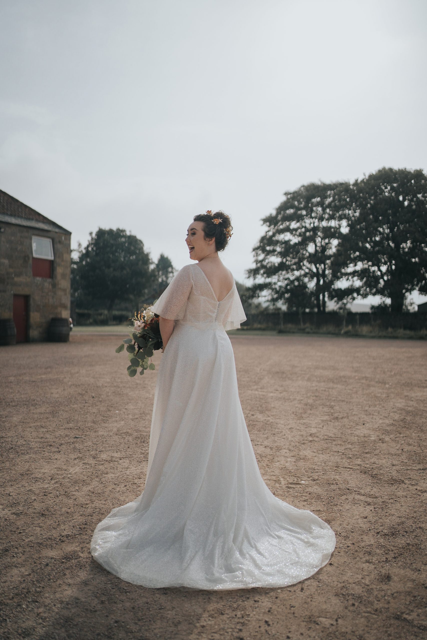 sparkly dress with cape detail