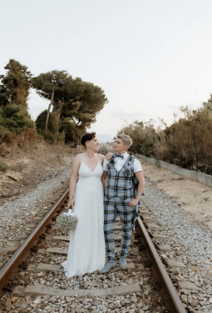 2 brides in tailoring for summer wedding